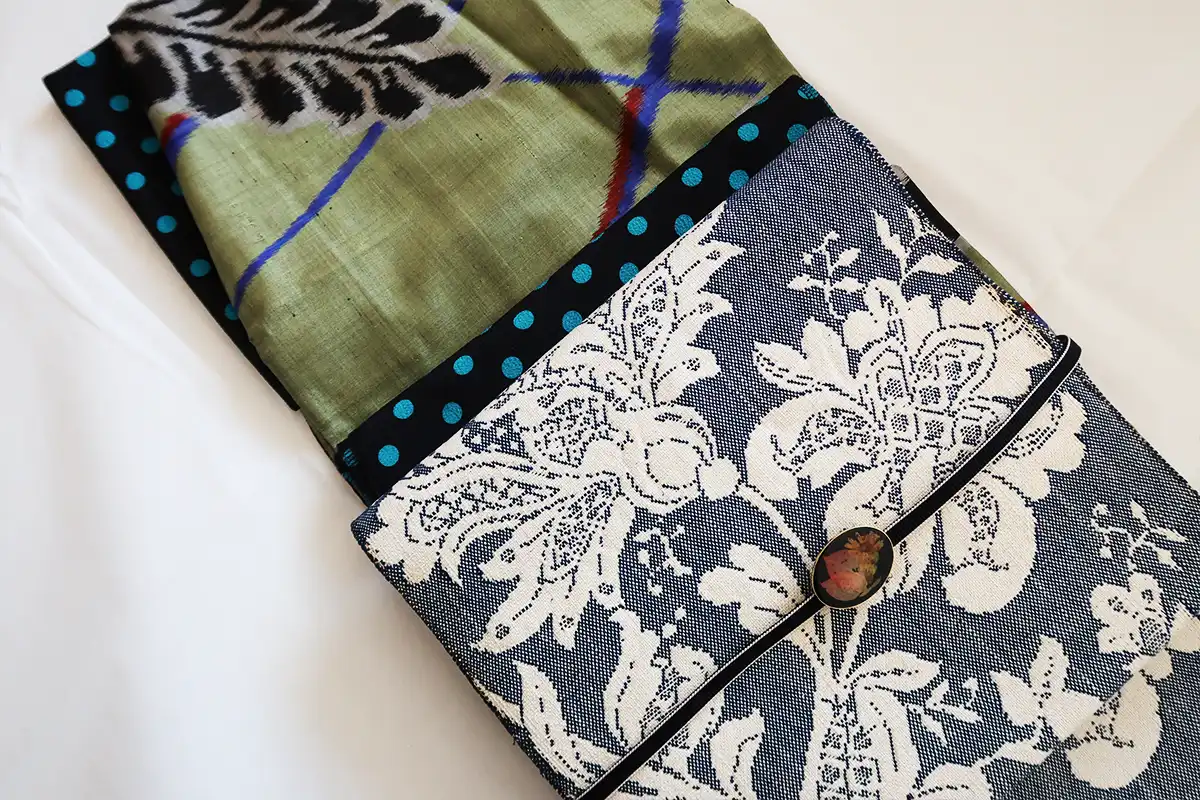 抹茶色の藤柄銘仙着物に紺地レース調の紬帯を合わせたコーデ 帯周り